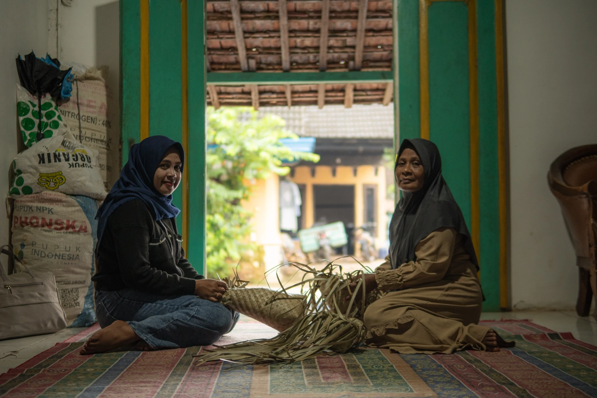 Women weaving and preserving local craft skills